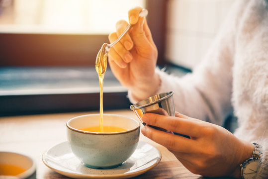 Woman Drink Hot Orange Tea