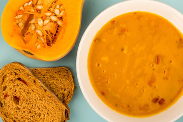 Bowl Of Vegetarian Butternut Squash Soup With Red Peppers