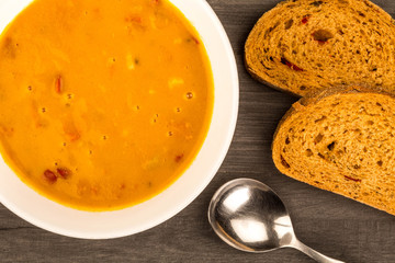 Bowl Of Vegetarian Butternut Squash Soup With Red Peppers