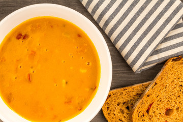 Bowl Of Vegetarian Butternut Squash Soup With Red Peppers