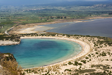 Fototapeta na wymiar View of Voidokilia beach in the Peloponnese region of Greece, from the Palaiokastro
