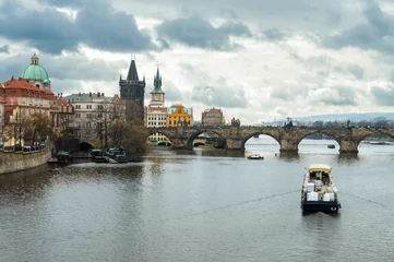 Deurstickers Charles bridge and travel boat, Prague, Czech Republic © Leonid