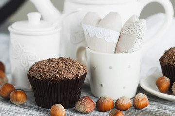 Teapot, cupcakes and different decorations