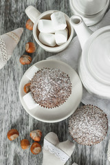 Teapot, cupcakes and different decorations