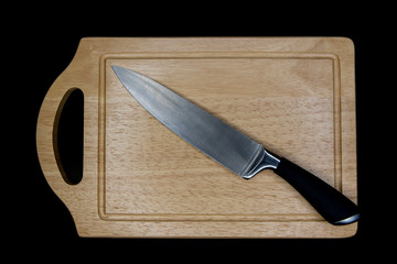Knife on the wood chopping board