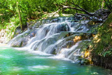 Beautiful summer landscape over the famous hot streams into the forest of Krabi region, Thailand