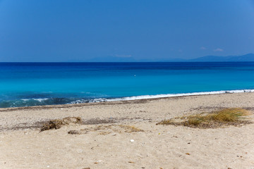 Fototapeta na wymiar Panoramic view of Girapetra Beach with blue waters, Lefkada, Ionian Islands, Greece