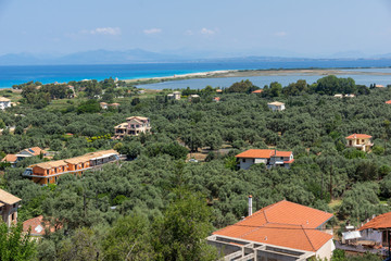 Fototapeta na wymiar Panoramic view of Agios Ioanis beach with blue waters, Lefkada, Ionian Islands, Greece