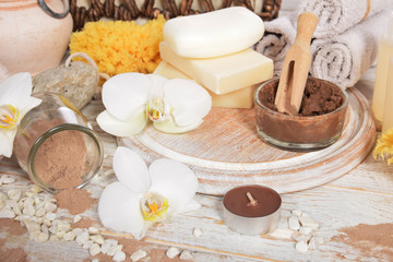 Fototapeta na wymiar chocolate mud for body and face with lemon with place for tekst