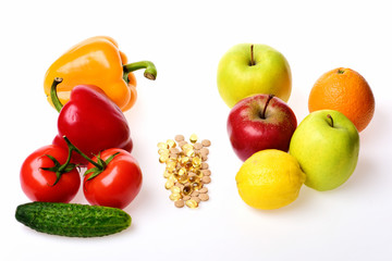 Omega 3 capsules, apples, citruses and vegetables.