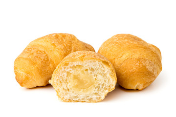 Croissants and half on a white