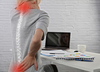 Business Woman suffering from back pain. Incorrect sitting posture problems. Pain relief ,...