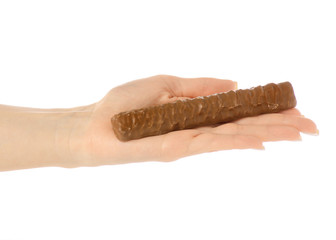 Chocolate bar stick in hand