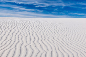Fototapeta na wymiar Tranquil image of white sand dunes and beautiful blue sky, White Sands National Monument