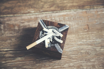cigarette in ashtray