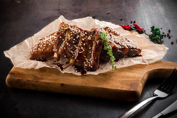Fried ribs on a cutting board