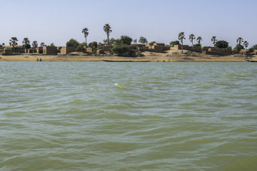 Mud houses along the shores of the Niger River, Mali
