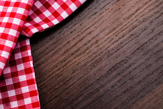 Napkin on the wooden background with copy space. Top view