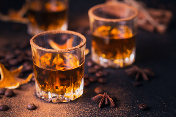 Whiskey, brandy or liquor, spices, anise stars, coffee beans, cinnamon sticks