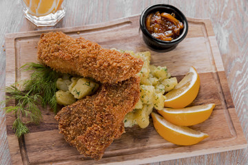 fish in breadcrumbs flounder with boiled potatoes