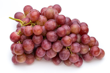 Ripe red grape isolated on white.