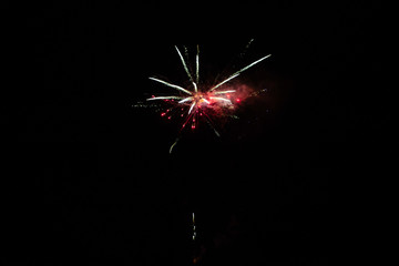 Eight colorful fireworks on black background