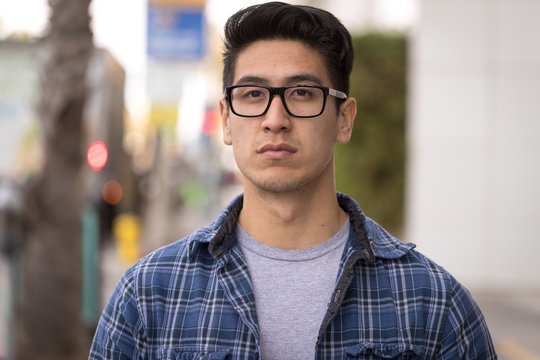 Young Asian Man Serious Face Portrait