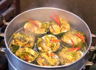 Steamed fish with curry paste.