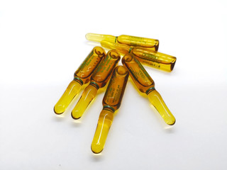 Medication and healthcare concept. Many transparent brown ampule of Paracetamol solution, that  is...