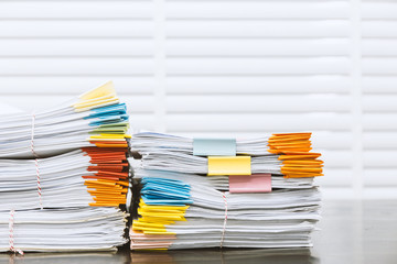 Paperwork pile print document unorganized put on the desk