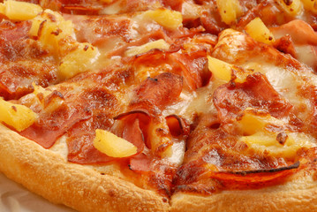 Closeup of a sliced pizza        