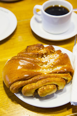 Cinnamon roll and coffee