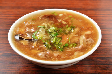 Pork thick soup on dinner table   