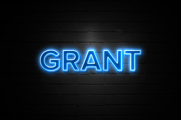 Obraz premium Grant neon Sign on brickwall