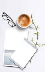 Obraz na płótnie Canvas Mock up of blank book cover ,cup of coffee,green plant and reading glasses
