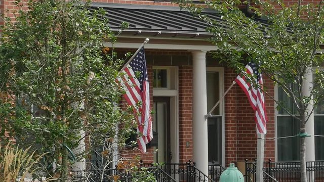  American Flag on House Blowing in Slow Motion