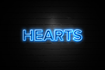 Fototapeta premium Hearts neon Sign on brickwall