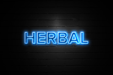 Fototapeta na wymiar Herbal neon Sign on brickwall