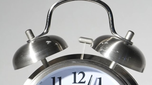 Twin Bell Silver Alarm Clock Isolated on White Close Up