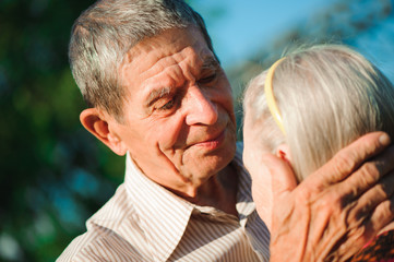 Happy senior couple in love. Park outdoors.