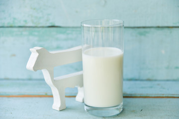 a glass of cow's milk and cow, the concept of gluten and village products