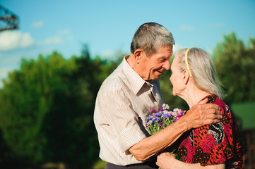Fototapeta premium Happy elderly couple at nature