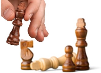 Businessman playing in chess