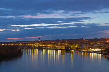 Night panorama of Georgetown suburb in Washington DC, USA. Key Bridge and Potomac River illuminated by street lights after a cloudy sunset. - 191286233