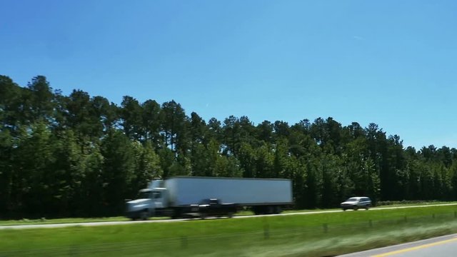 Driving on open Highway Truck Passing on Road Trip