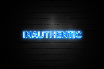 Inauthentic neon Sign on brickwall