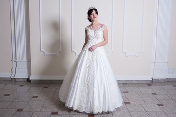 Fototapeta premium Beautiful bride in wedding dress