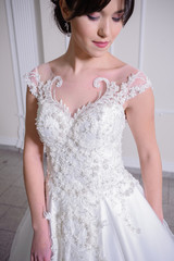 Fototapeta premium Beautiful bride in wedding dress