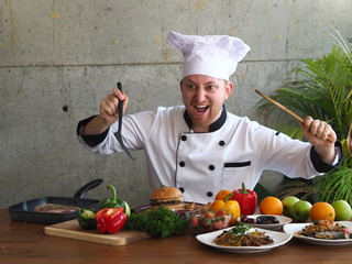 Angry chef with ingredients in the kitchen.