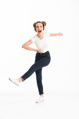 Full length portrait of a joyful casual girl